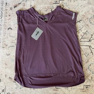 GYMSHARK PURPLE WASH HIGH LOW SHIRT PLEATED BACK